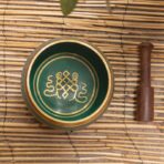 green metal singing bowl