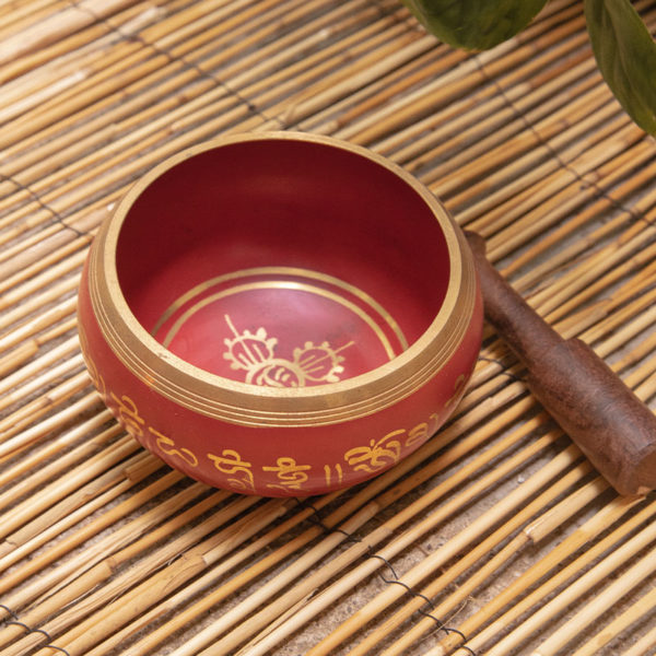 red metal singing bowl